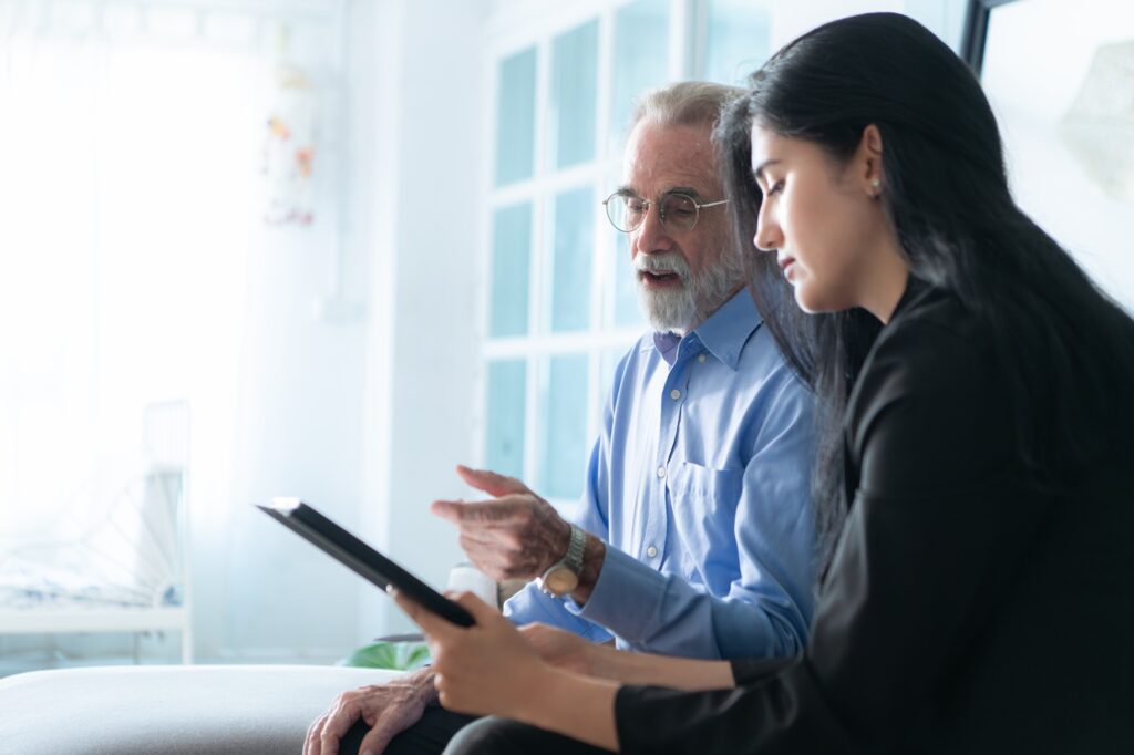 Senior executives and insurance agents providing detailed information about the insurance policy