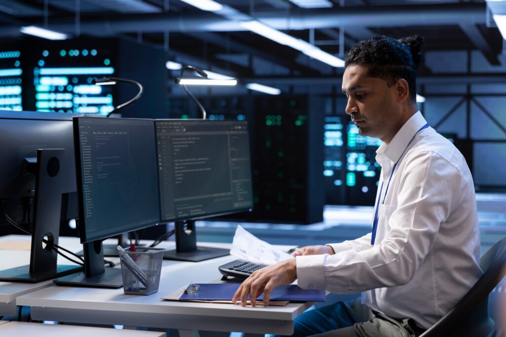 Server hub employee ensuring compliance with industry regulations